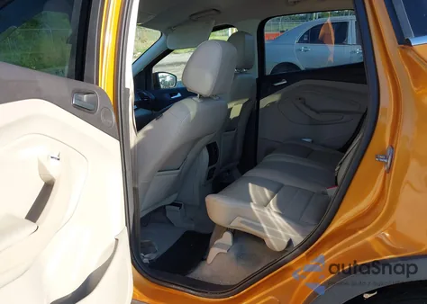 2016 Ford Escape Titanium z USA, uszkodzony, nr VIN 1FMCU0J97GUB31326